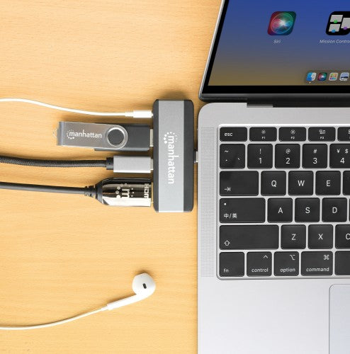 Manhattan USB-C Travel Dock/Hub, Ports (x4): HDMI, USB-A, USB-C and 3.5mm audio, With Power Delivery (100W) to USB-C Port, USB powered (no external power supply required)